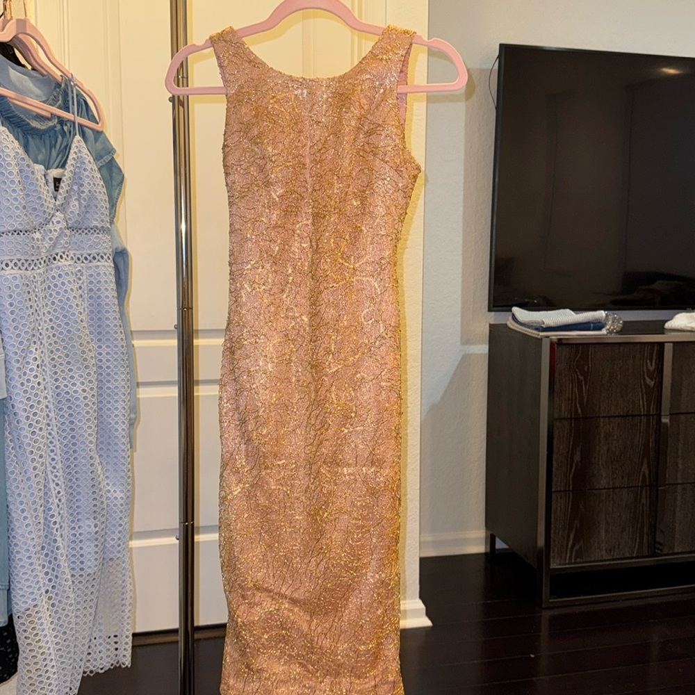 Opened back pencil cocktail dress by Touta